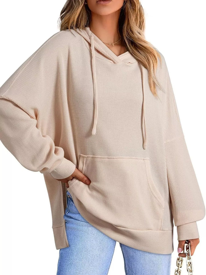 Oversized waffle-knit hoodie with side slits and front pocket