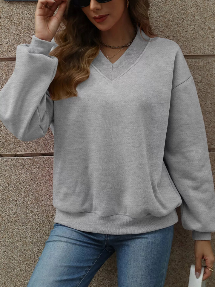 V-neck drop-shoulder pullover sweatshirt with ribbed trim