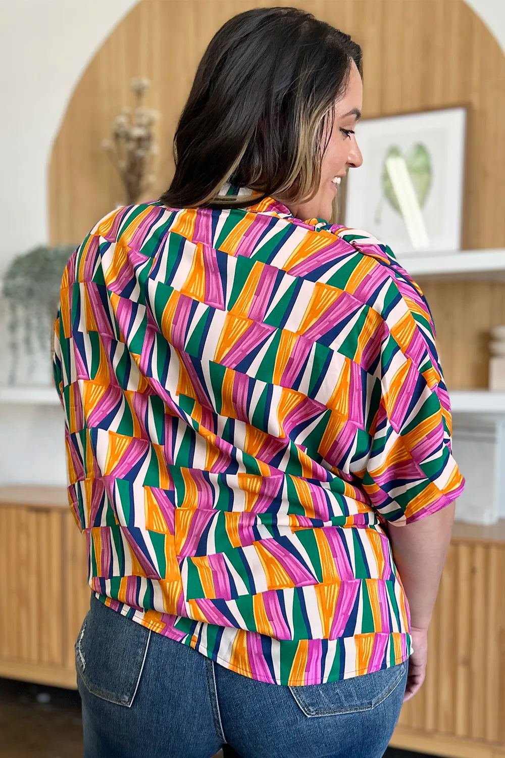 Geometric print notched neck dolman sleeve top