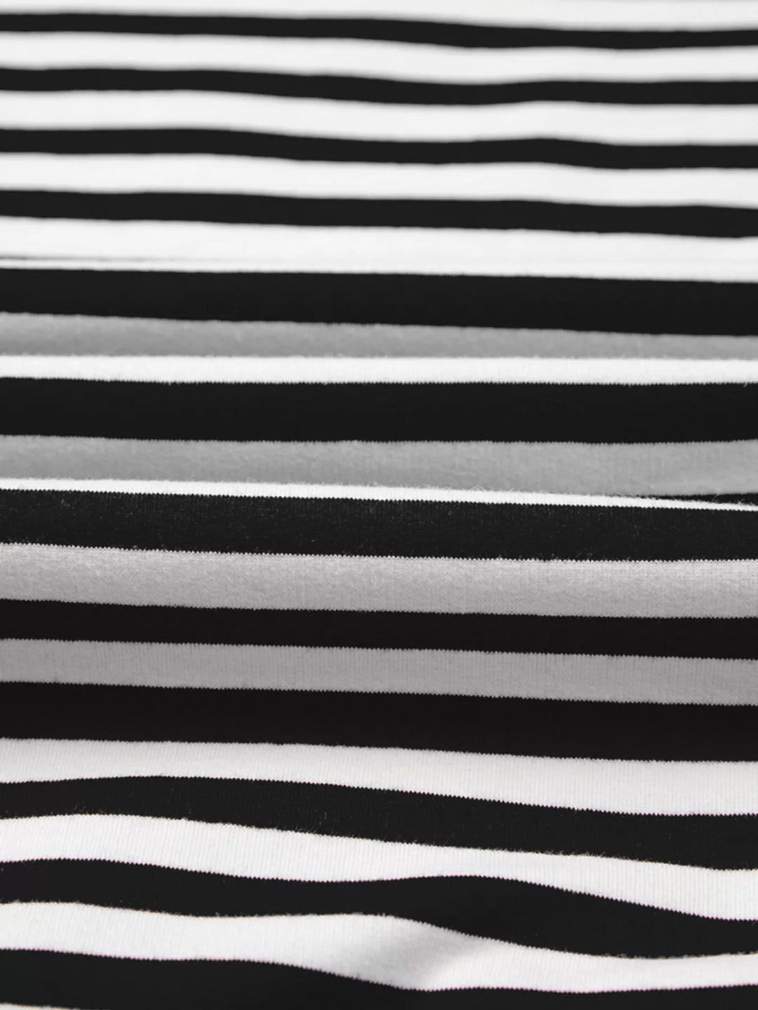 Exposed seam striped drop-shoulder pullover top