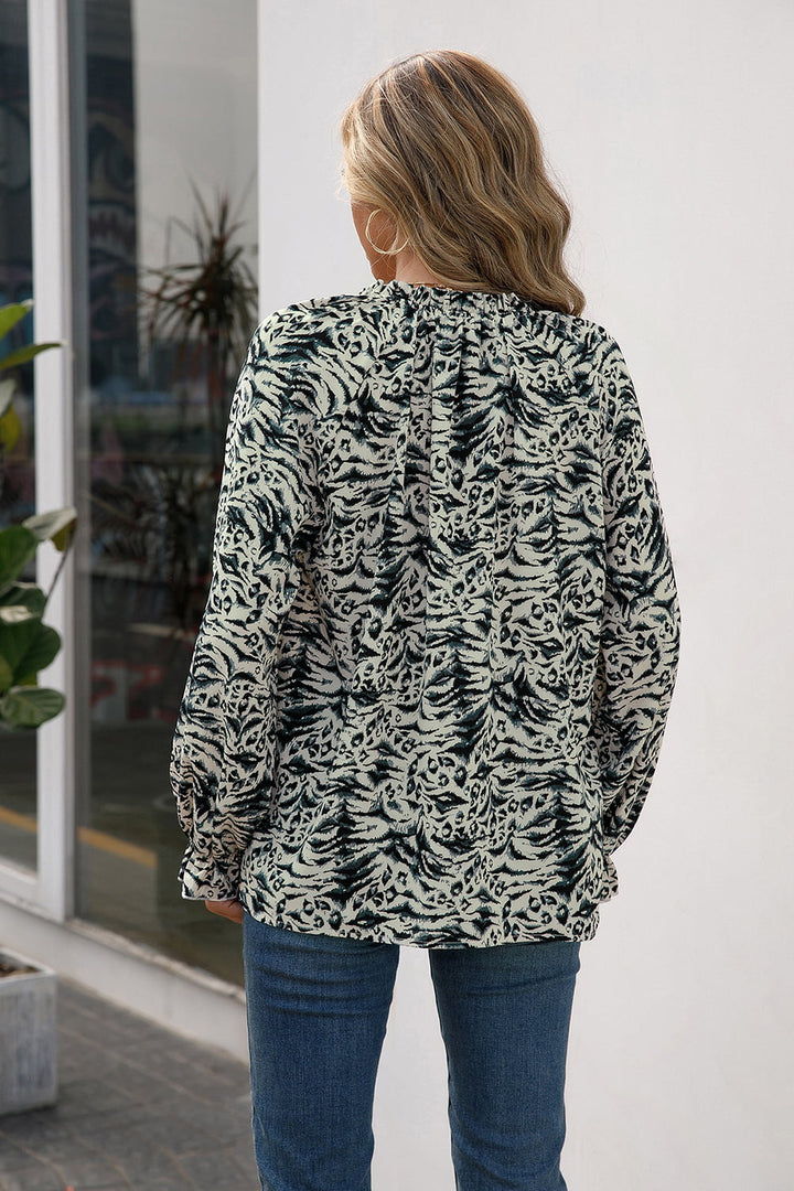 Animal print tie-neck blouse with flounce sleeves