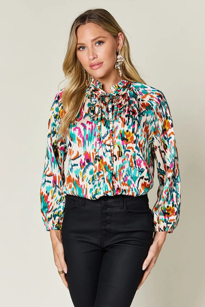 Teal Abstract print button-up shirt with tie neck and long sleeves