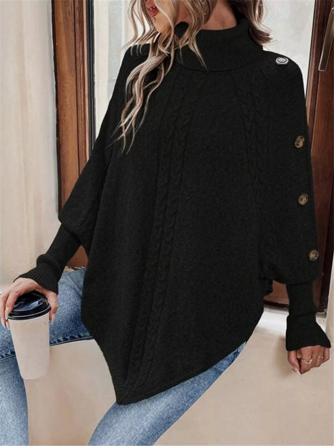 Cable knit turtleneck cape sweater with button shoulder