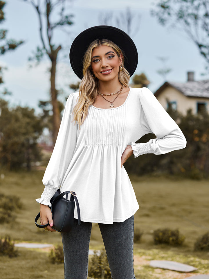 Pintuck pleated puff sleeve blouse with smocked cuffs