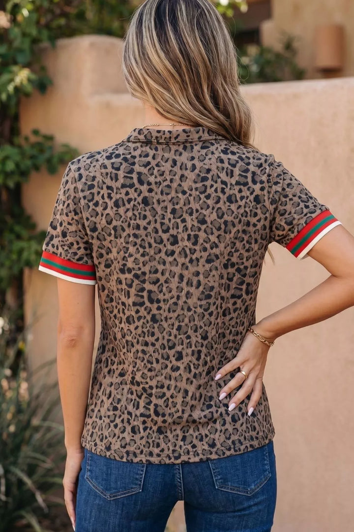 Leopard half-zip short sleeve top with striped collar and cuffs