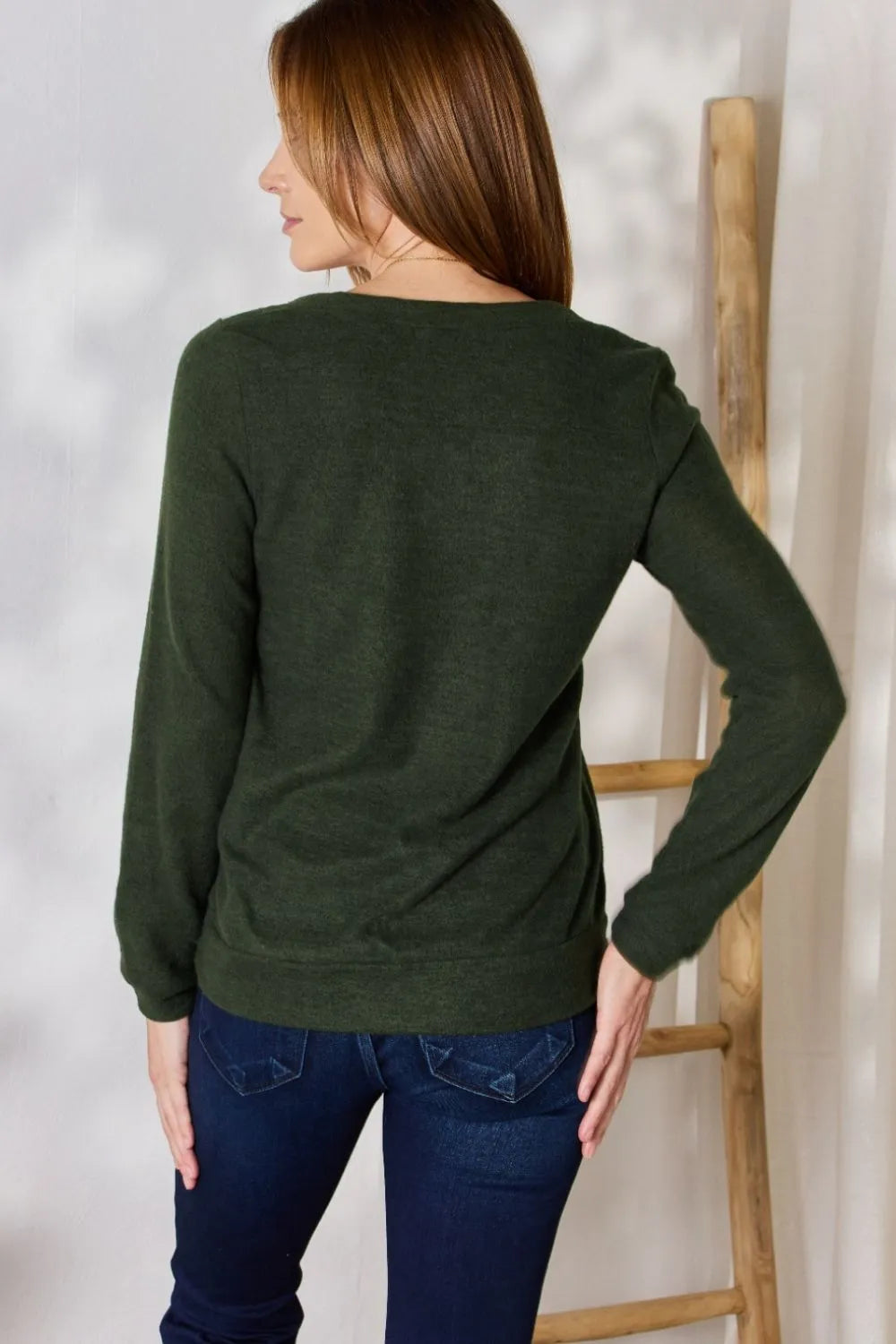 Color block chevron knit V-neck top with long sleeves