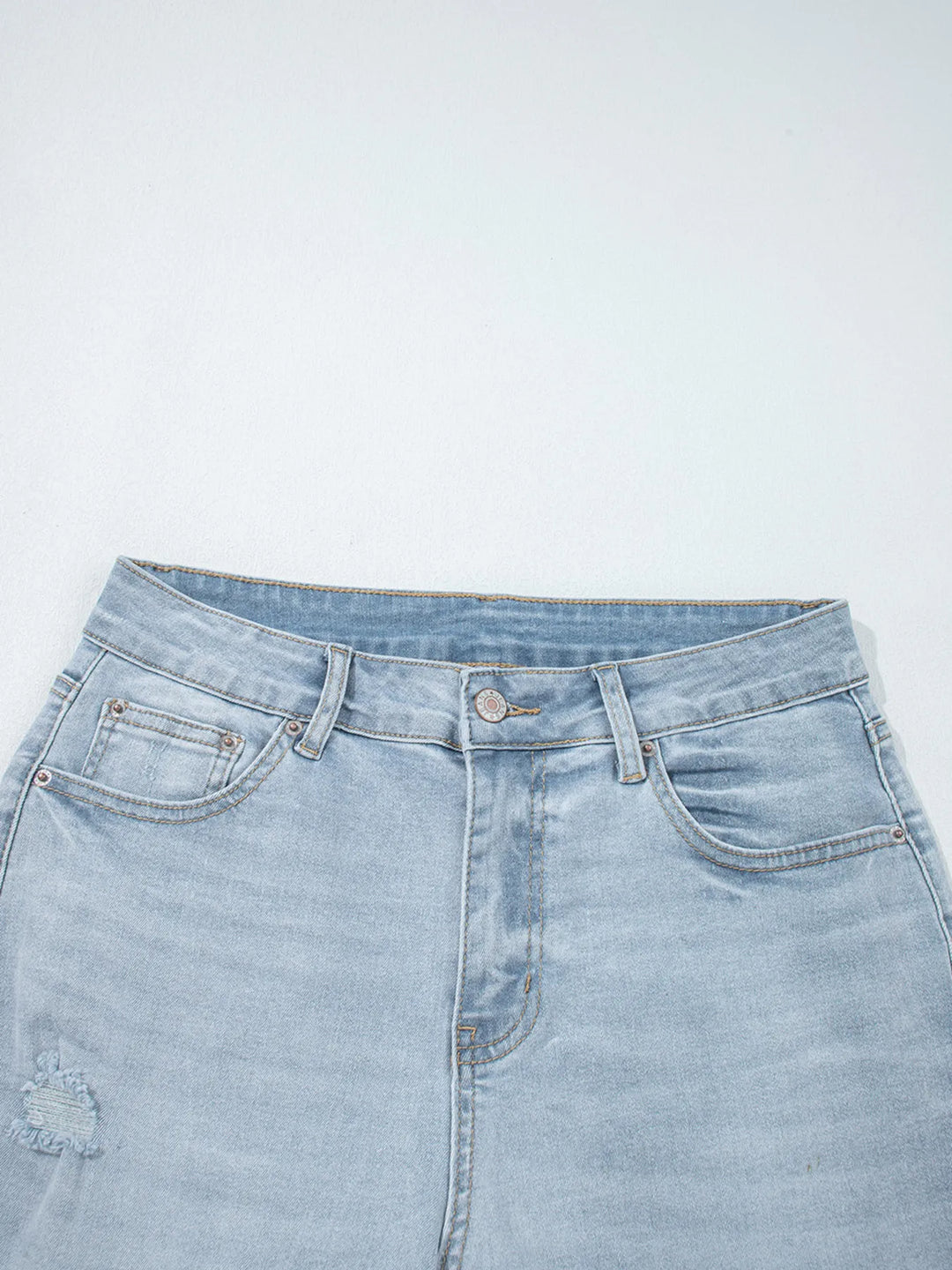 Distressed mid-rise ankle skinny jeans with raw hem