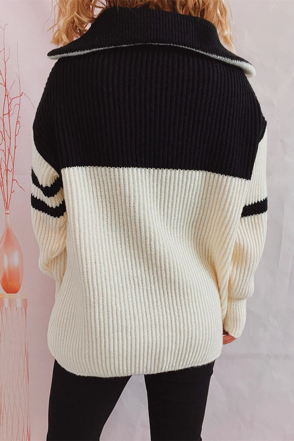 Quarter-zip ribbed knit sweater with striped sleeves