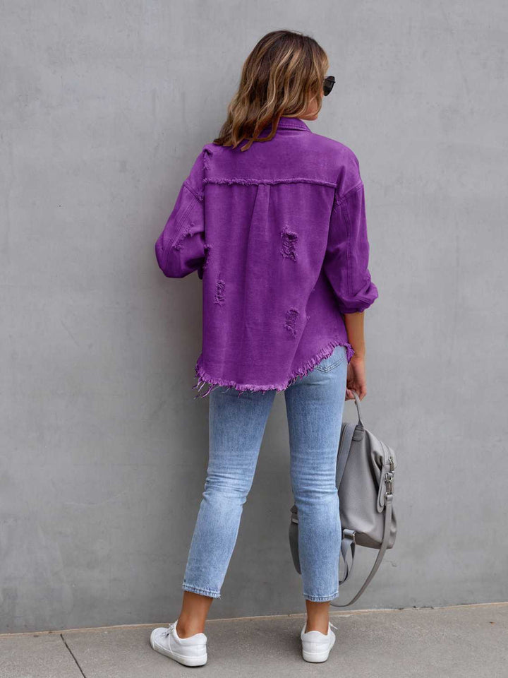 Distressed drop shoulder denim jacket with fringe hem