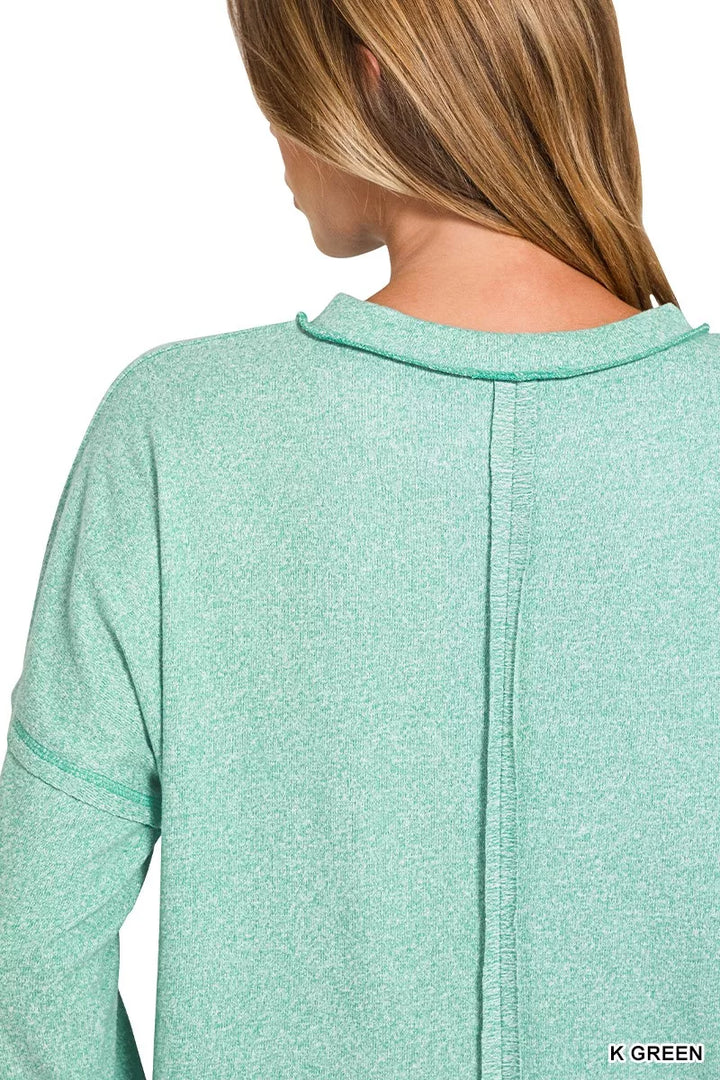 Oversized melange Hacci knit long sleeve top with chest pocket