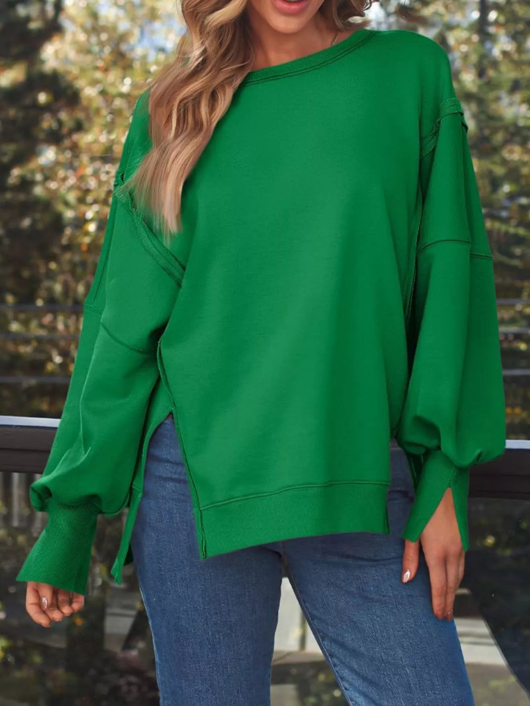 Oversized side-slit sweatshirt with exposed seams