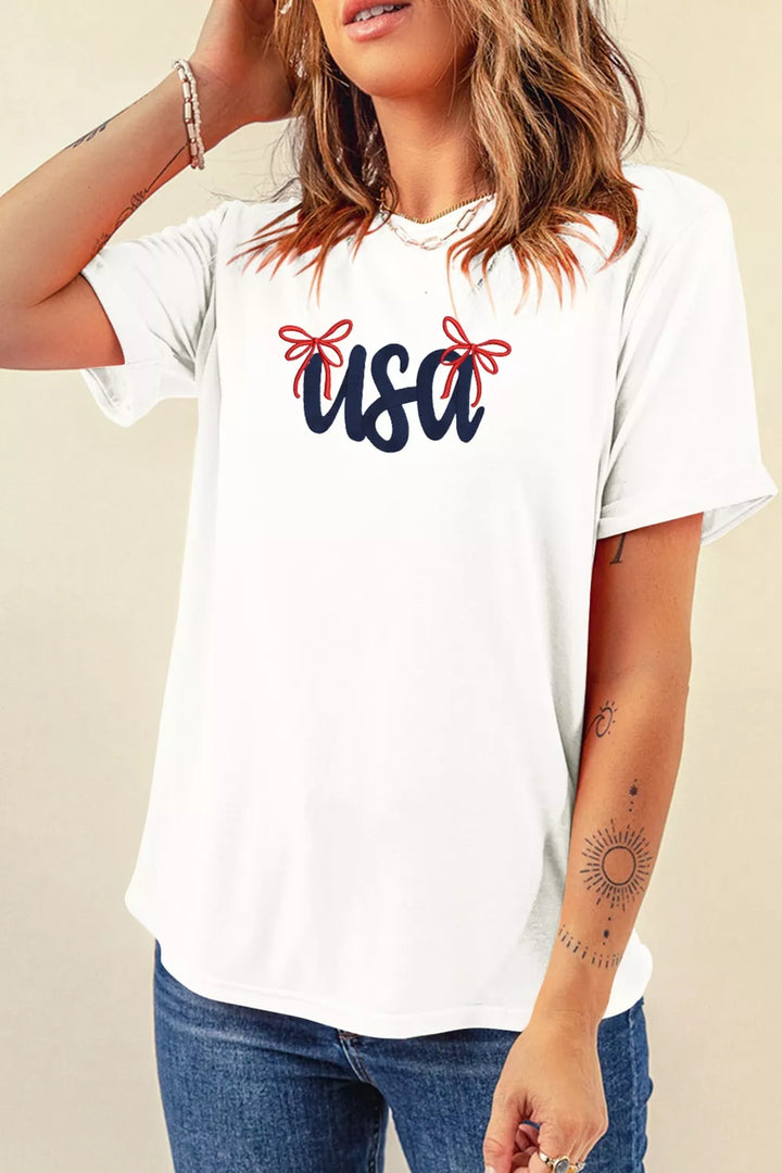Embroidered USA script tee with red bow detail