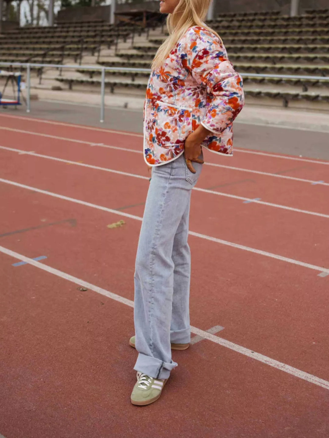 Floral print quilted jacket with contrast piping and patch pockets