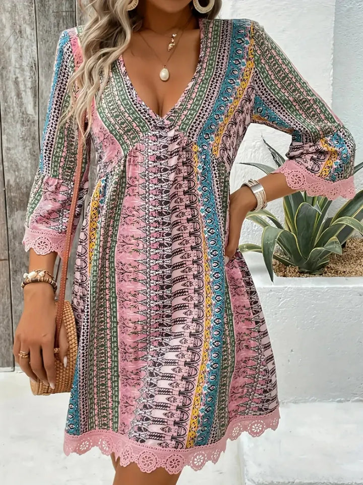 Blush Pink Boho printed mini dress with lace trim and bell sleeves