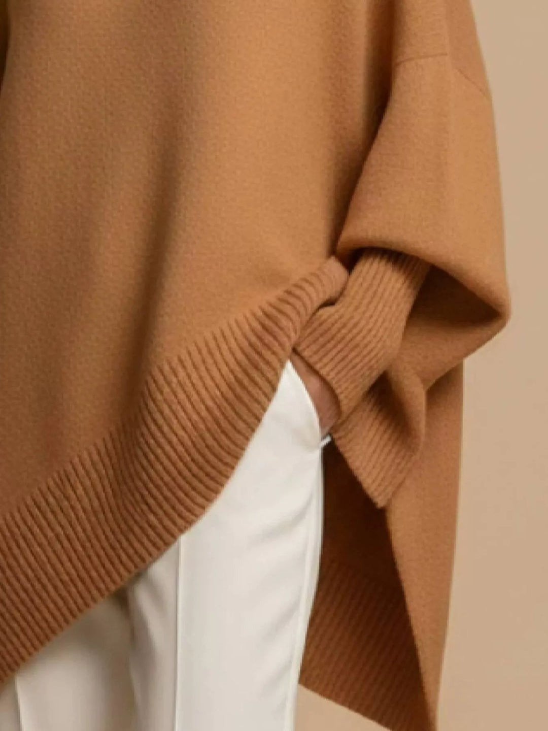 Batwing sleeve asymmetric hem oversized knit sweater
