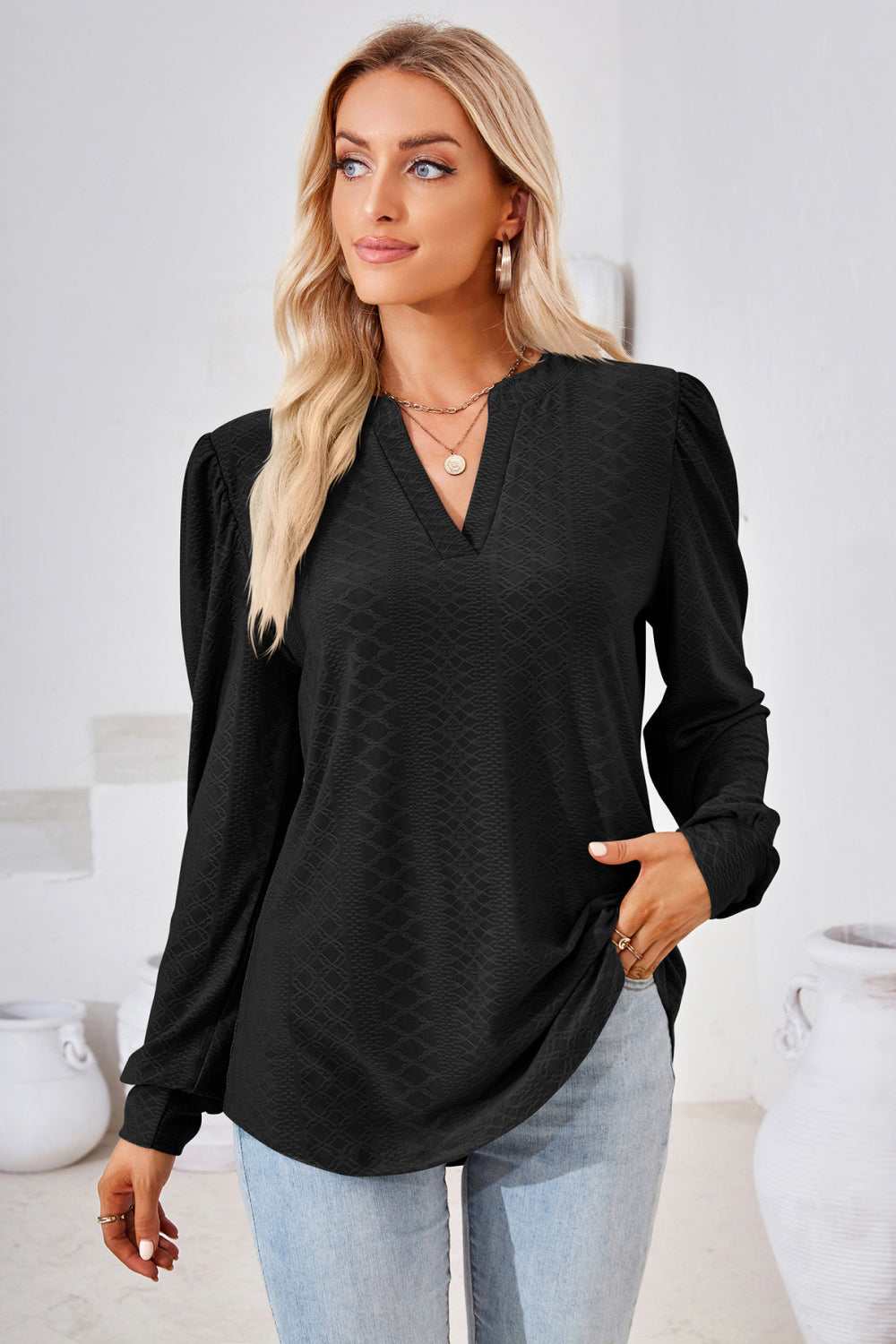 Textured knit split-neck puff sleeve blouse