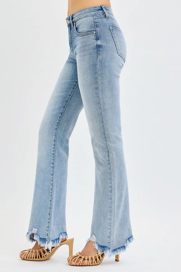 Mid-rise flare jeans with frayed raw hem and tummy control