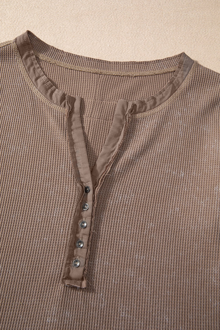 Waffle knit henley top with long sleeves and button placket