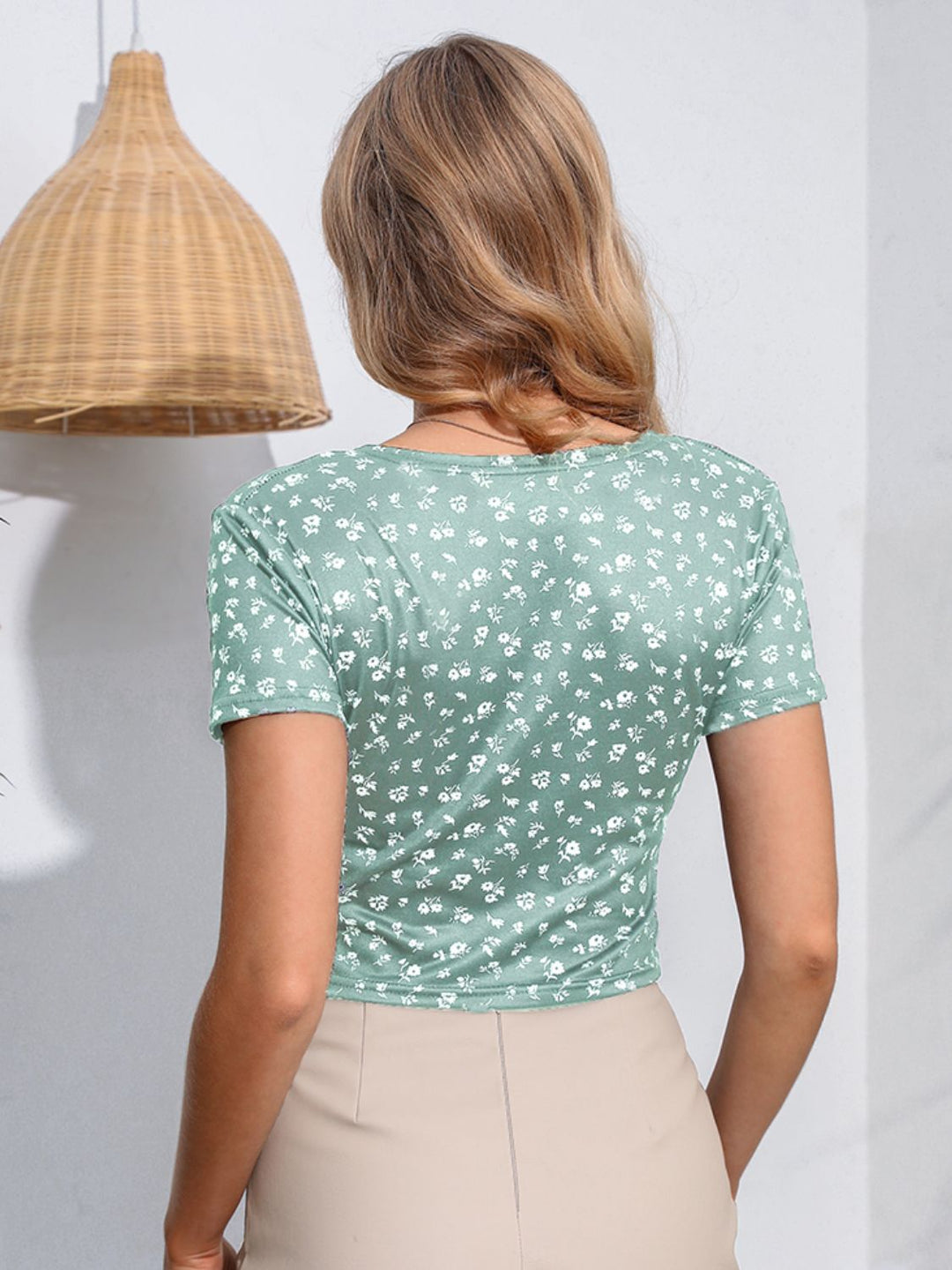 Floral surplice wrap crop top with short sleeves