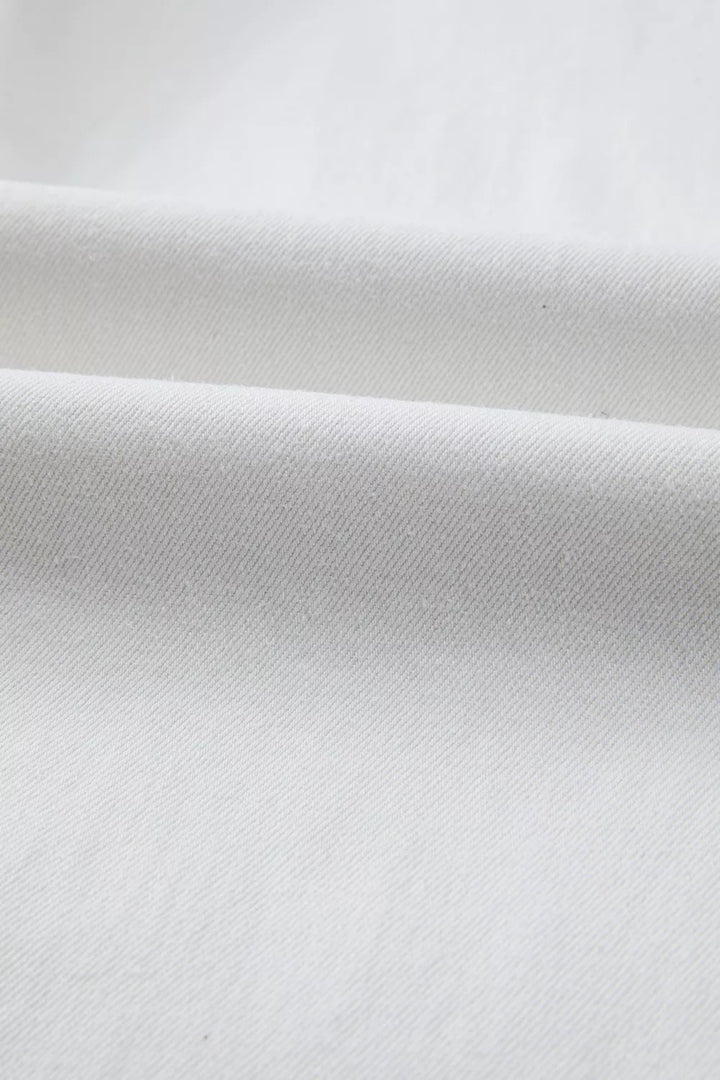 High-rise straight leg jeans with released hem