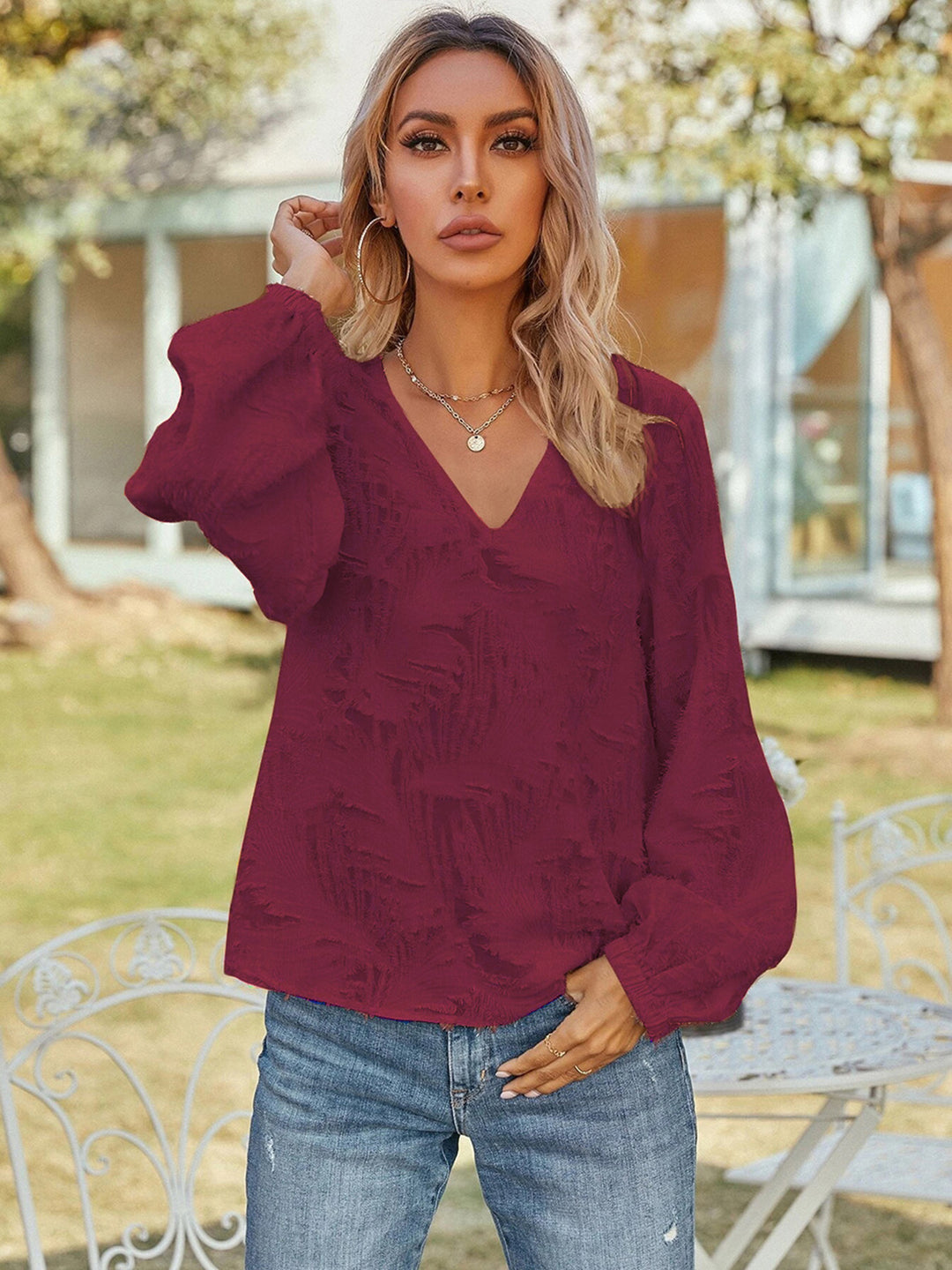 Burgundy Textured v-neck blouse with balloon sleeves
