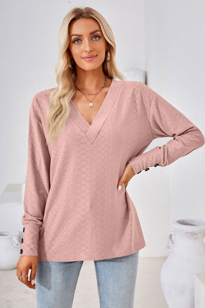 Textured knit V-neck long sleeve top with button cuffs