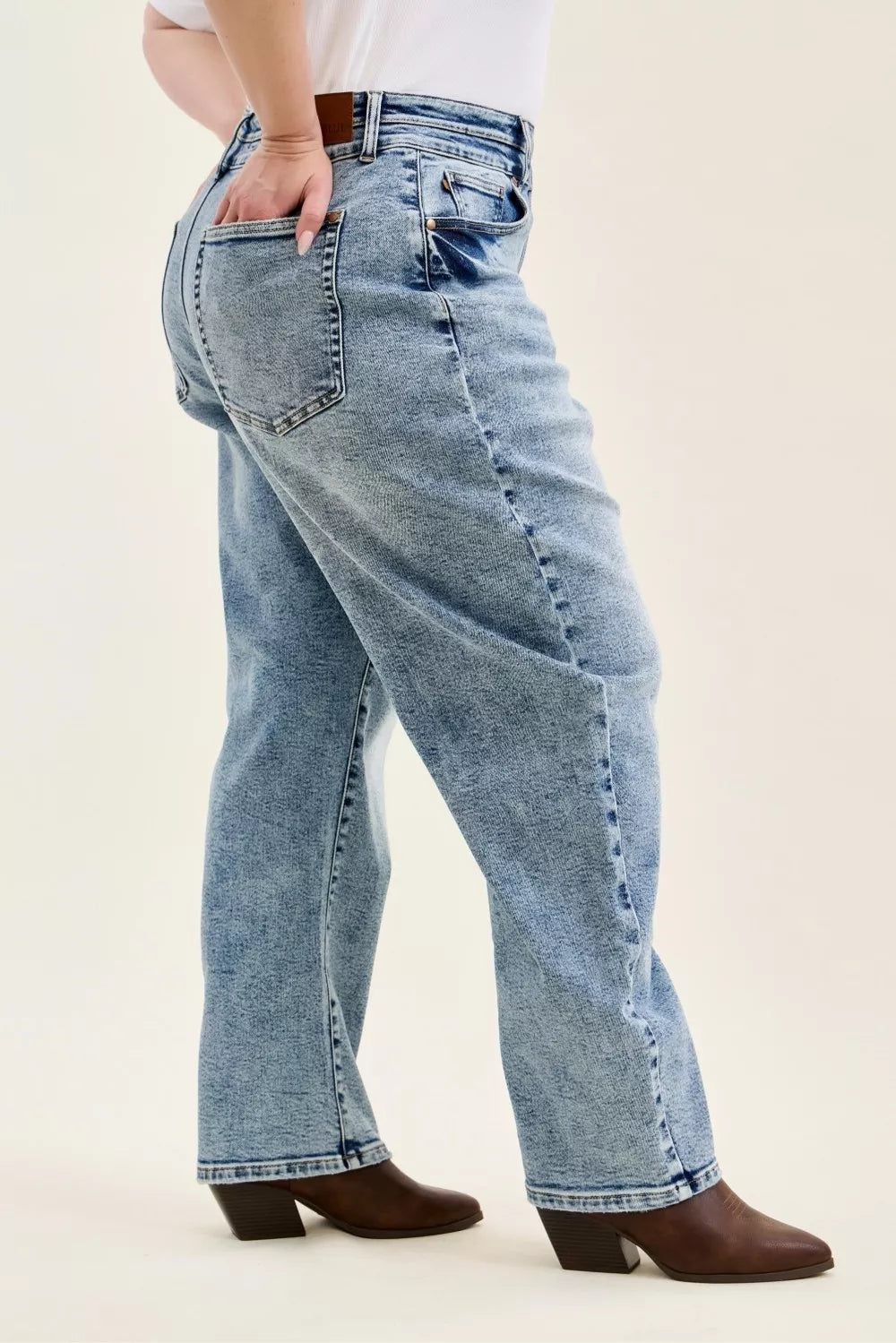 High-rise arc leg jeans with double waistband