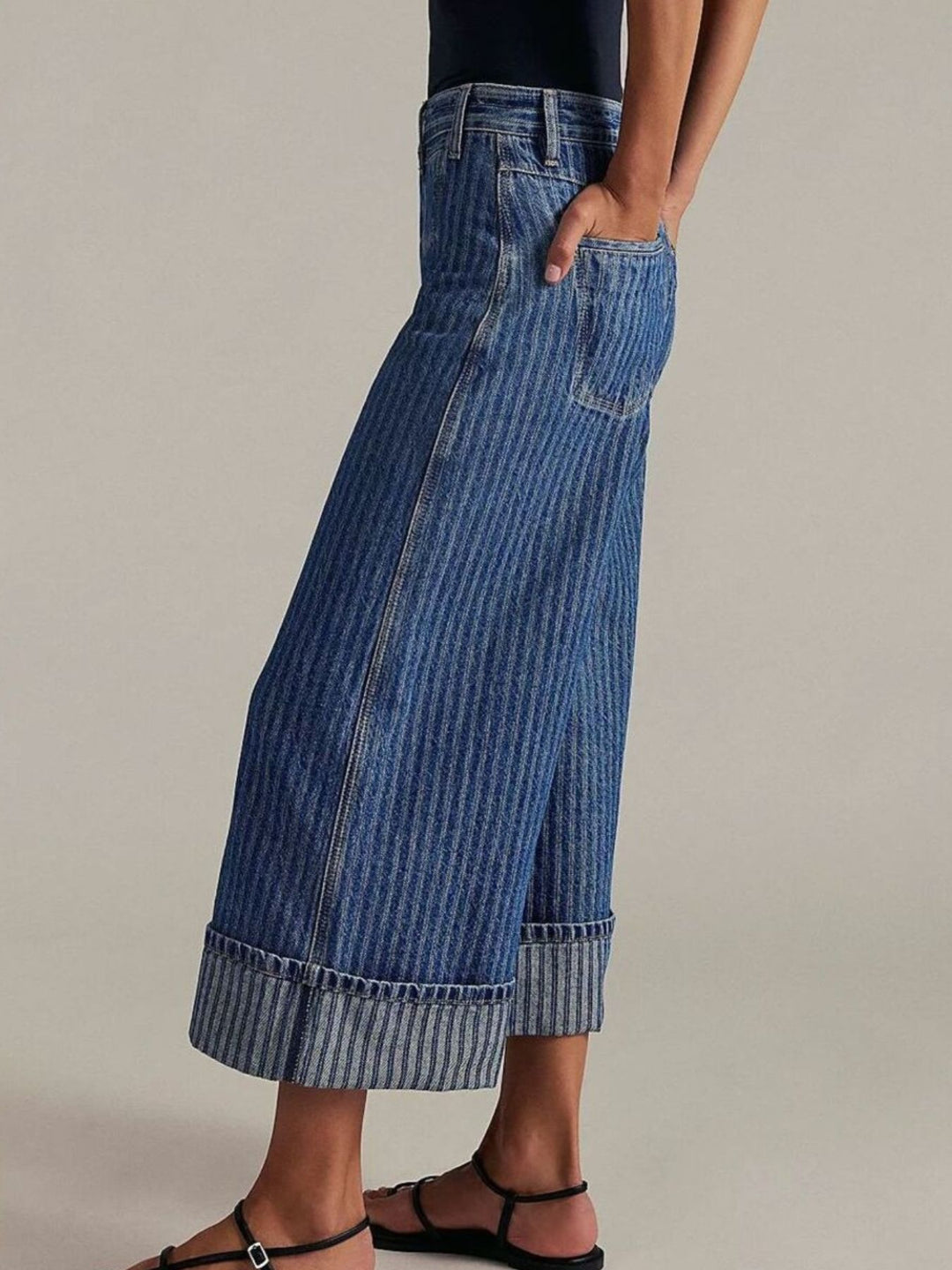 Wide-leg cropped jeans with deep cuffed hem and center seam