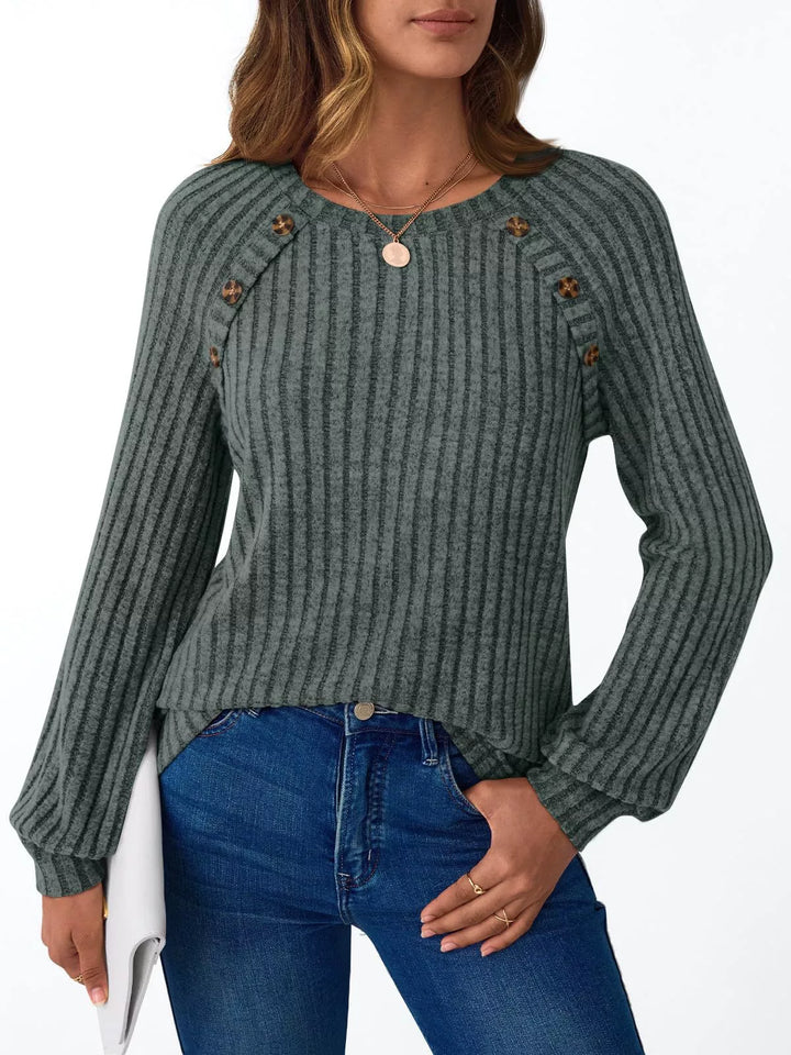 Ribbed knit long sleeve top with decorative shoulder buttons