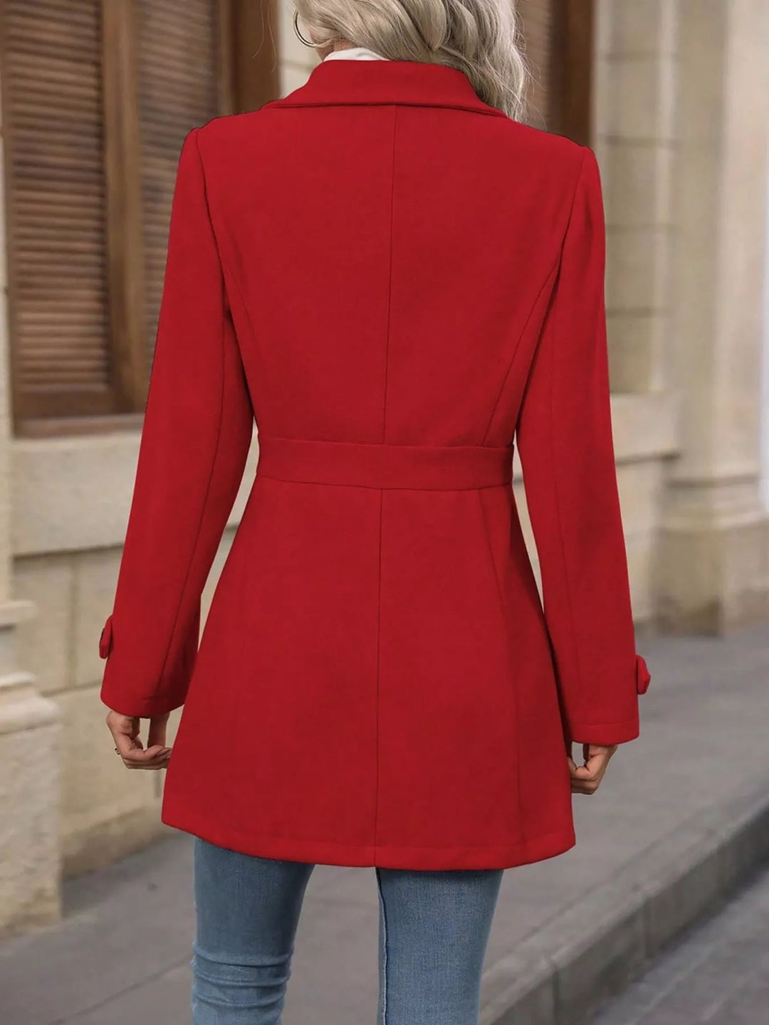 Single-breasted lapel coat with waist tabs and pockets