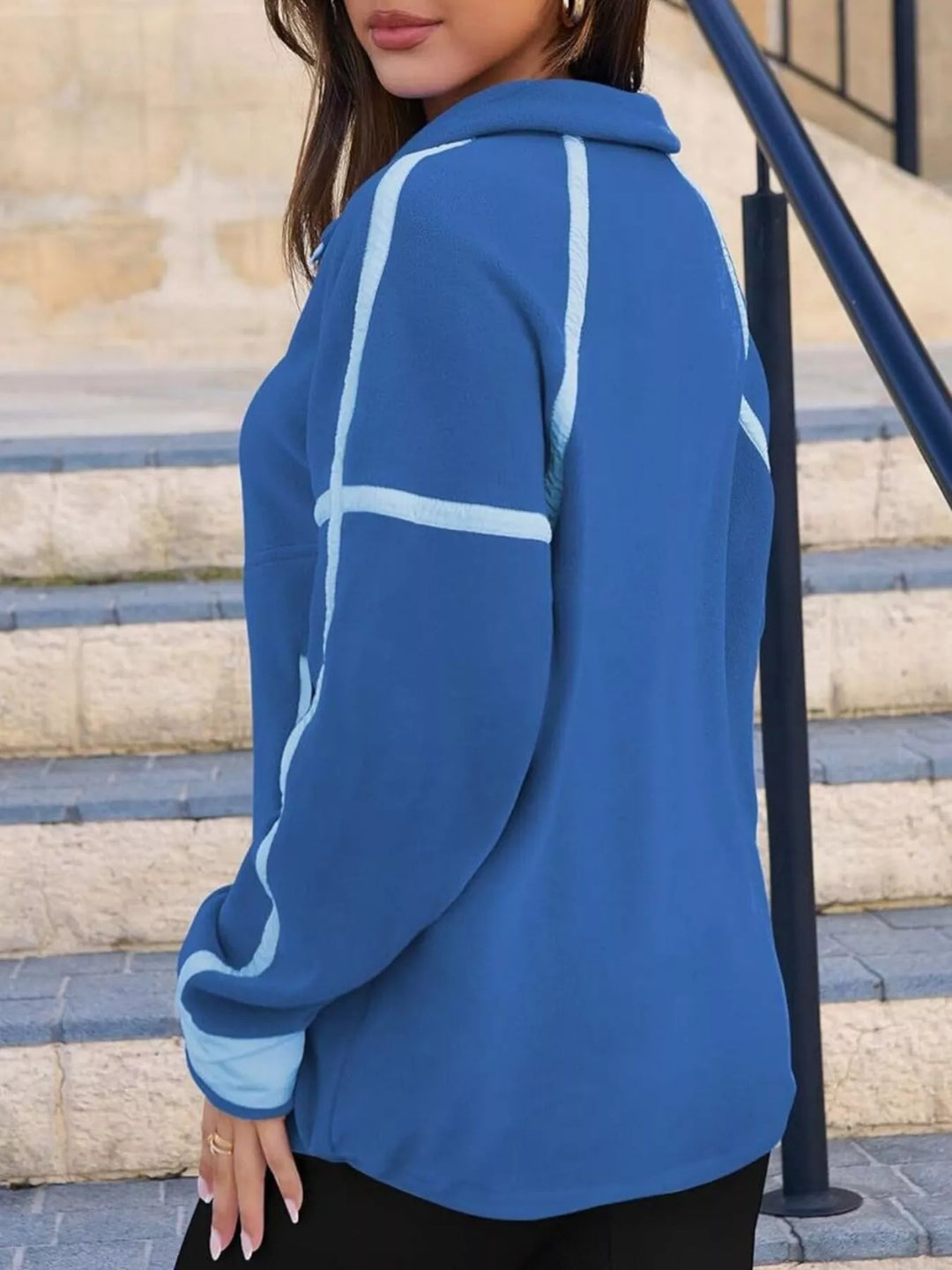 Half-zip fleece pullover with contrast trim and zip pockets