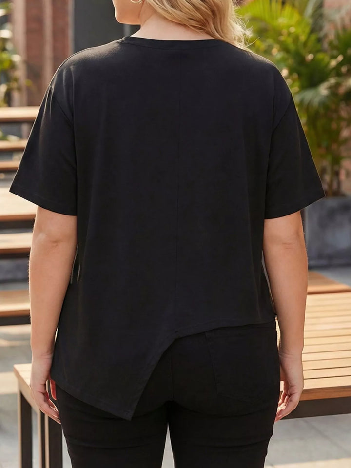 Plus-size short sleeve top with asymmetrical button hem