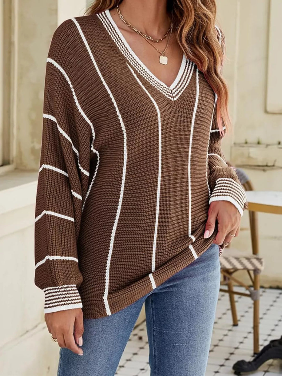 Striped V-neck ribbed knit sweater with drop shoulders