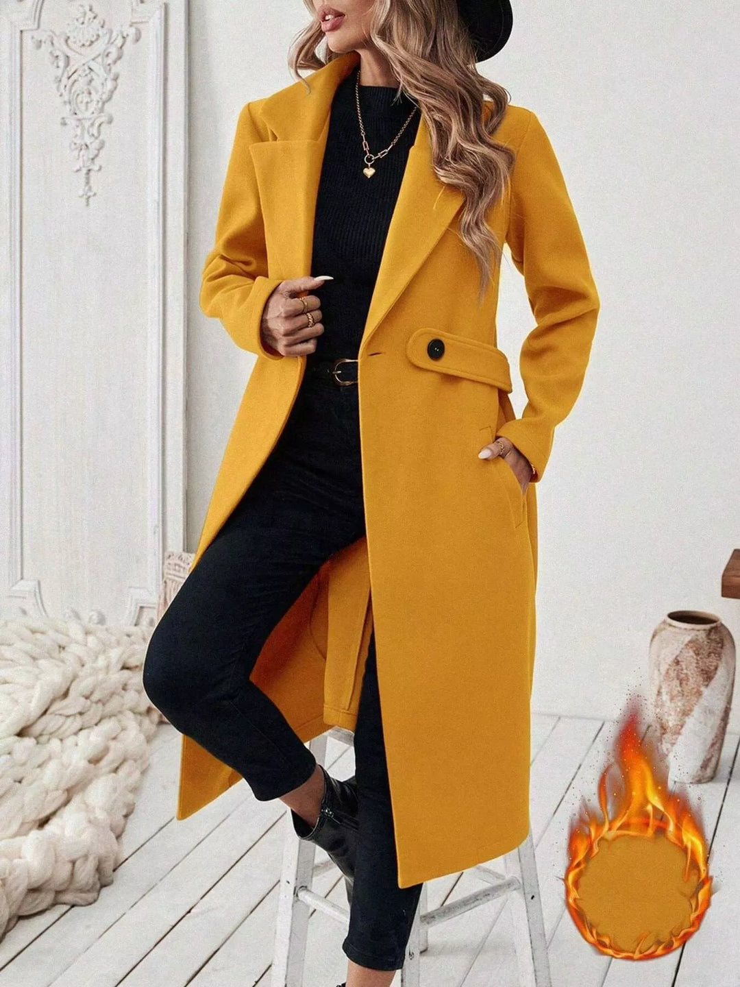 Longline notch lapel coat with single-button waist tab