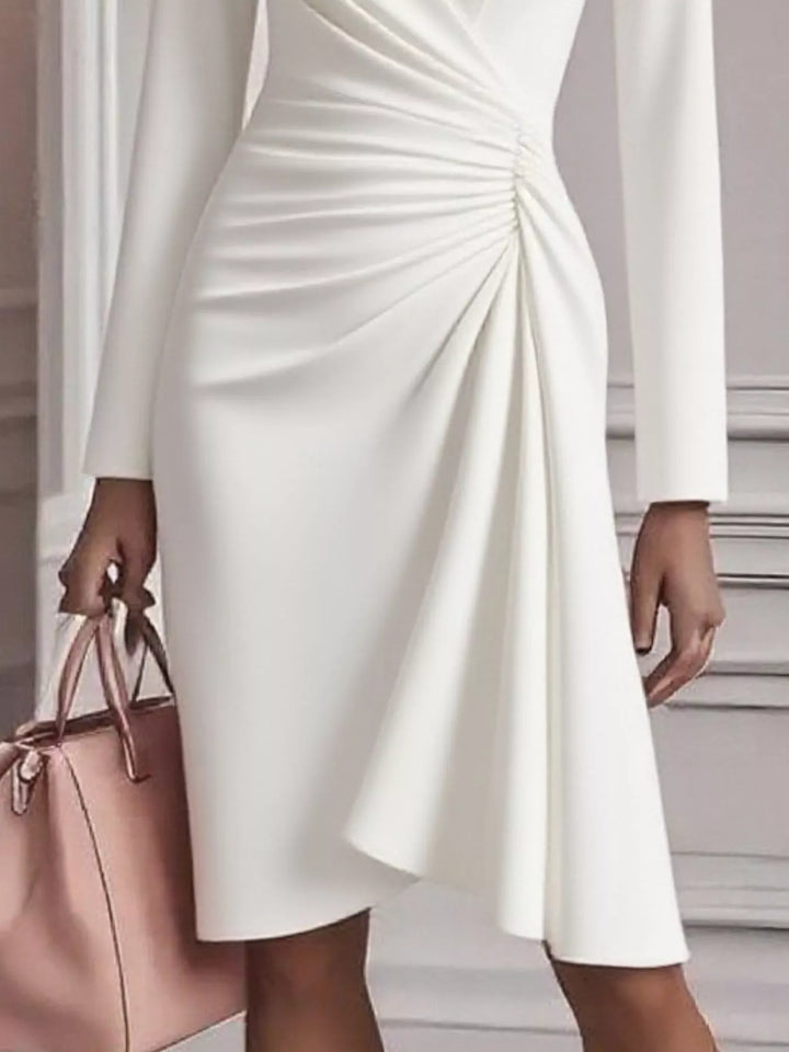 Ruched surplice long sleeve midi dress with asymmetric hem