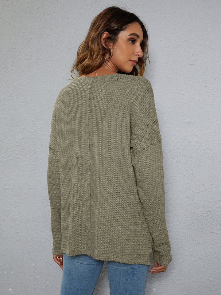 Dropped-shoulder waffle-knit V-neck top with high-low hem