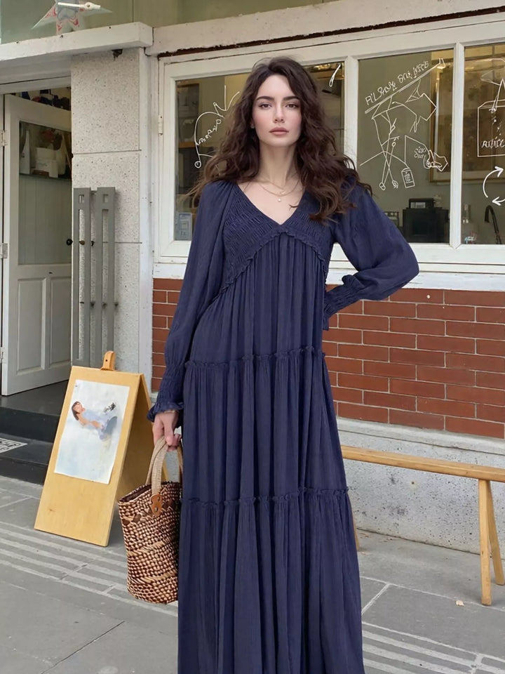 Sea Blue Smocked v-neck tiered maxi dress with long sleeves