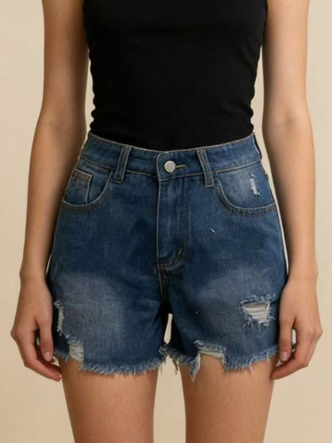 Distressed high-rise denim shorts with frayed raw hem