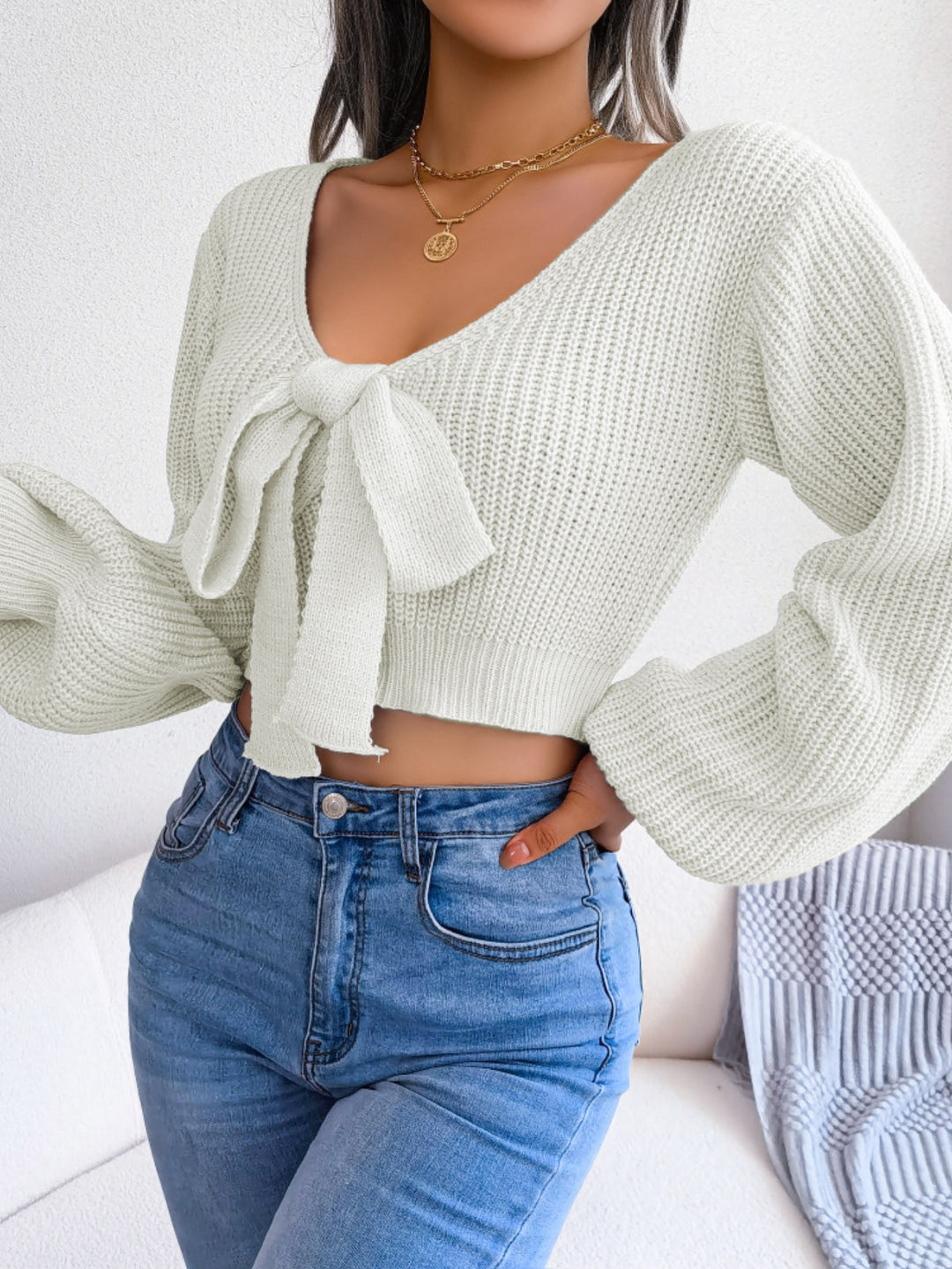Tie-front ribbed knit cropped sweater with deep V-neck