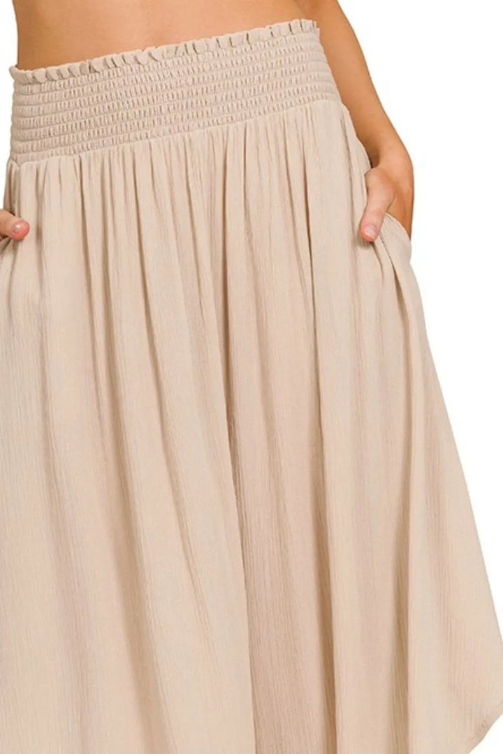 Crinkle smocked-waist high-low maxi skirt with pockets