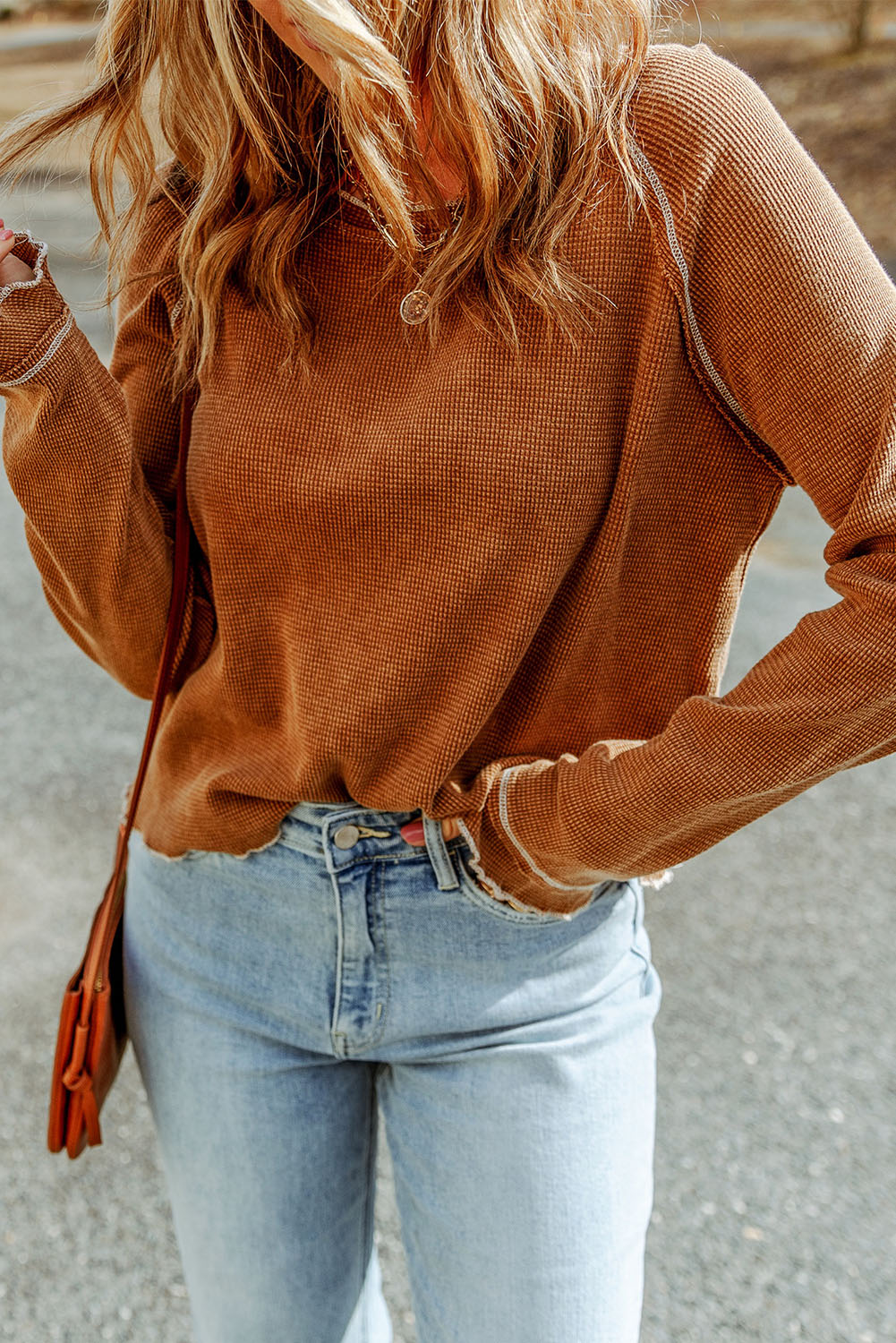 Waffle knit raglan sleeve top with ruffle cuffs