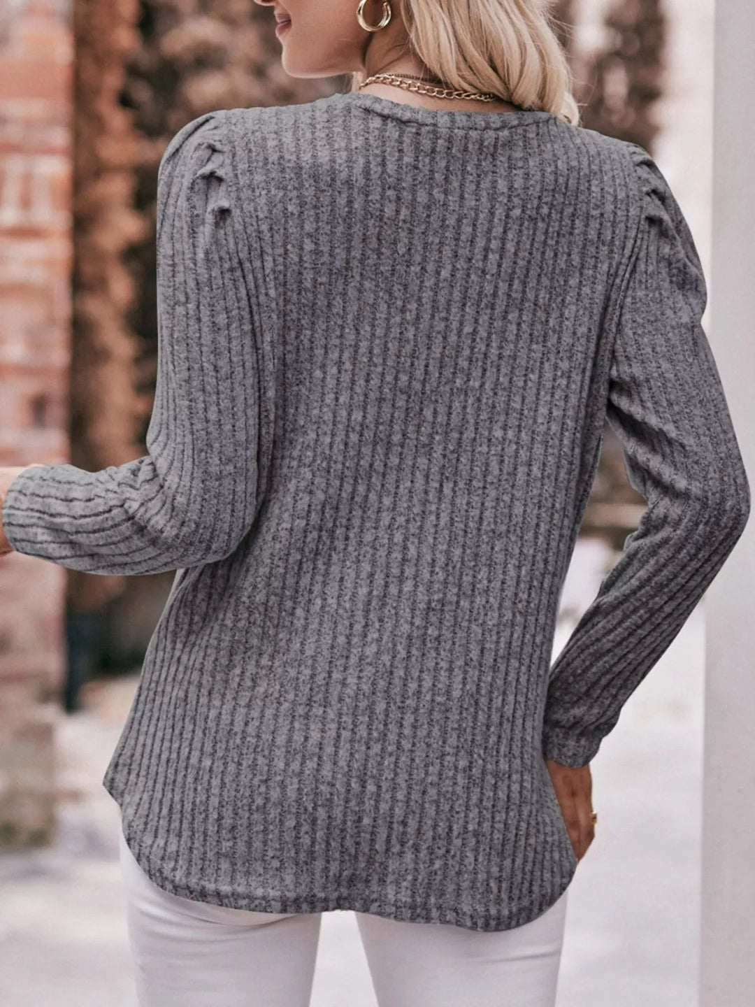 Ribbed knit long sleeve top with puff shoulders