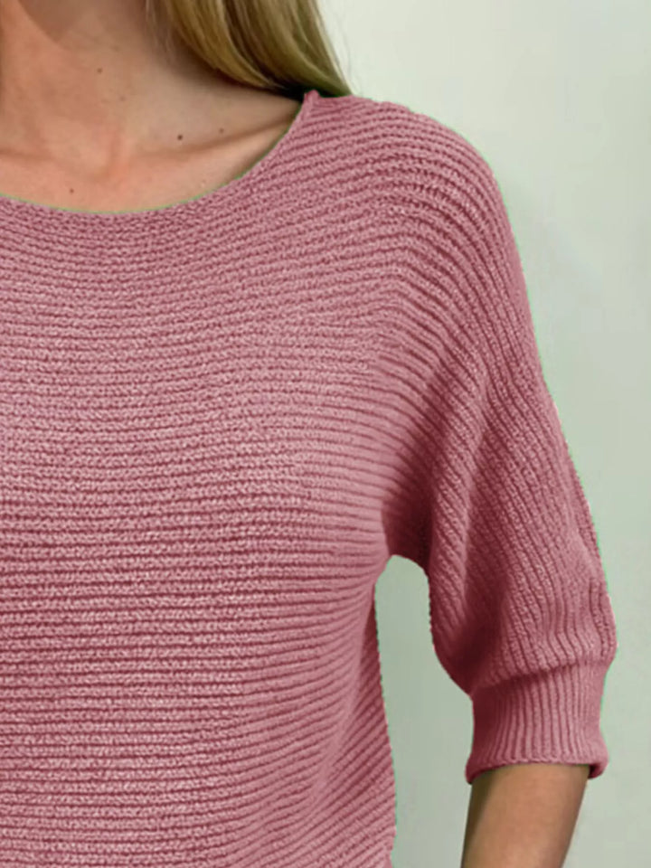 Ribbed knit round neck sweater with dolman sleeves