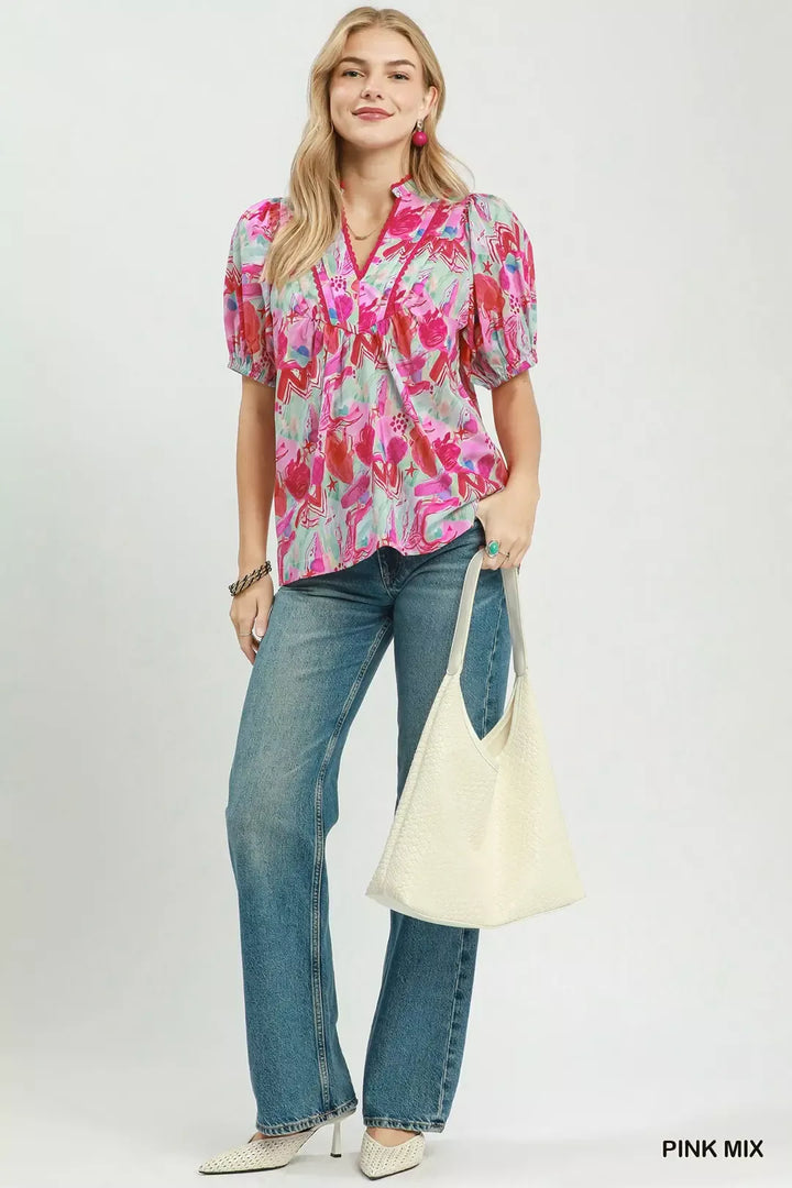 Abstract print puff sleeve top with ruched yoke