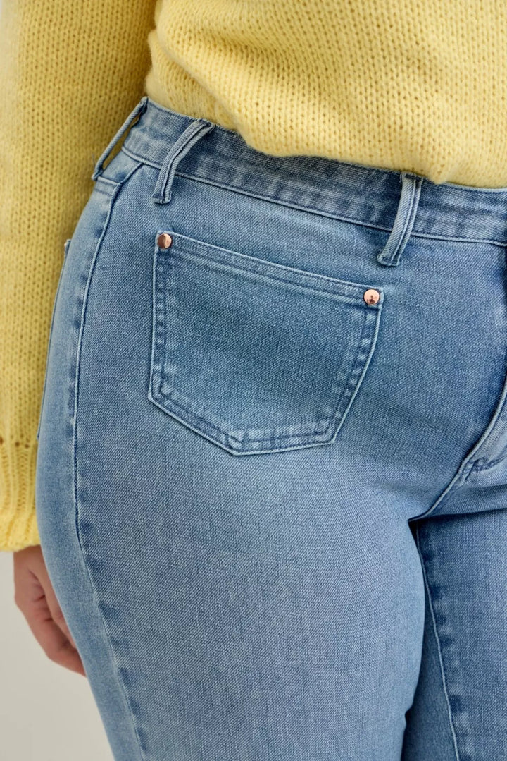 Mid-rise contrast wash bootcut jeans with front patch pockets