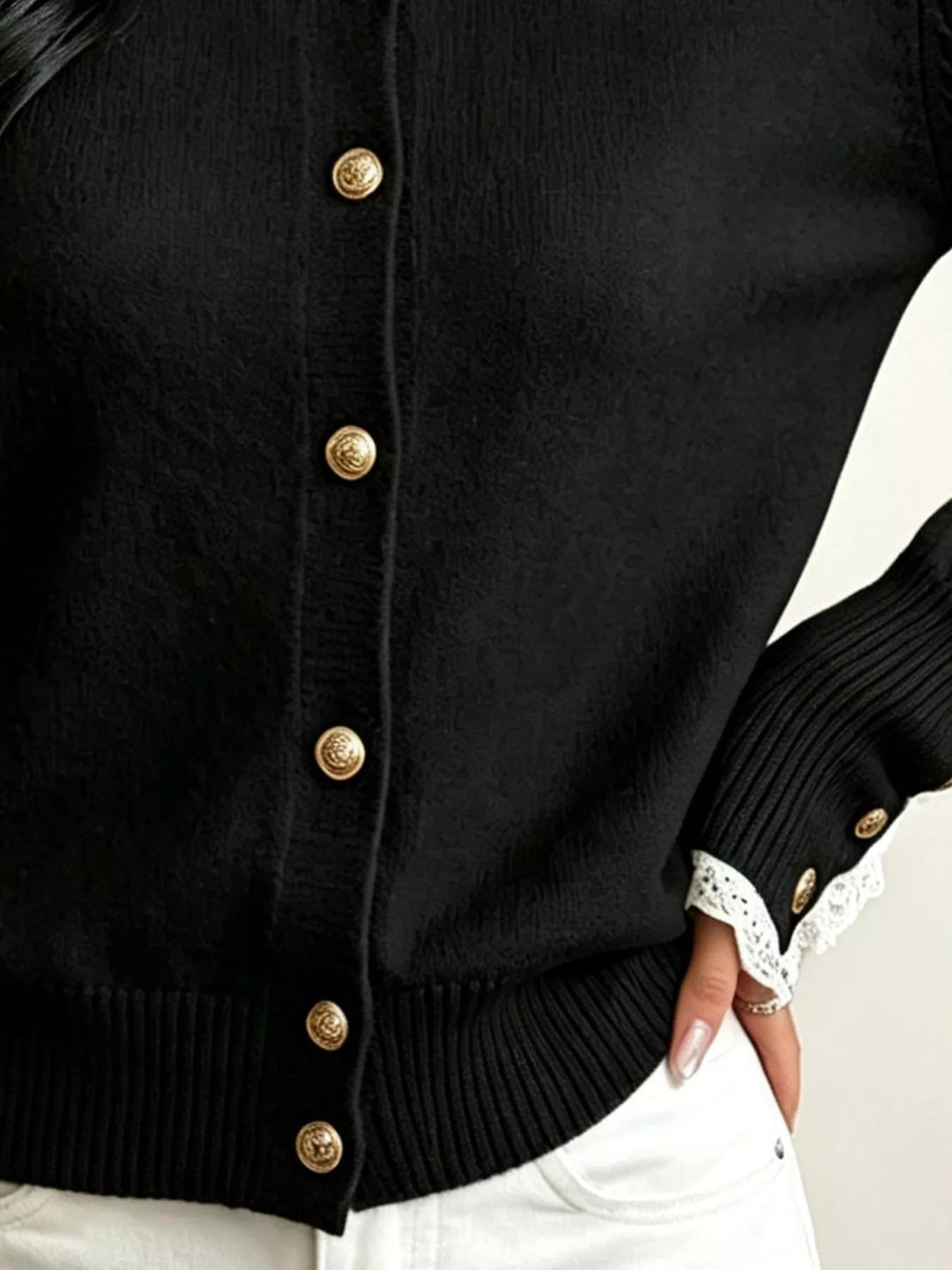 Lace trim crew neck sweater with buttoned ribbed cuffs