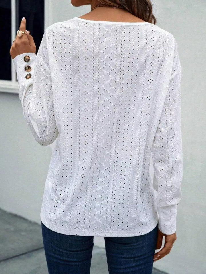 Eyelet V-neck long sleeve top with button cuffs