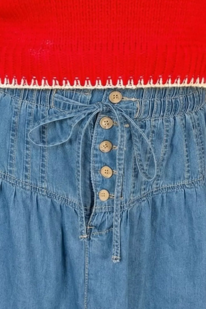 Tie-waist button-front denim mini skirt with ruffle hem