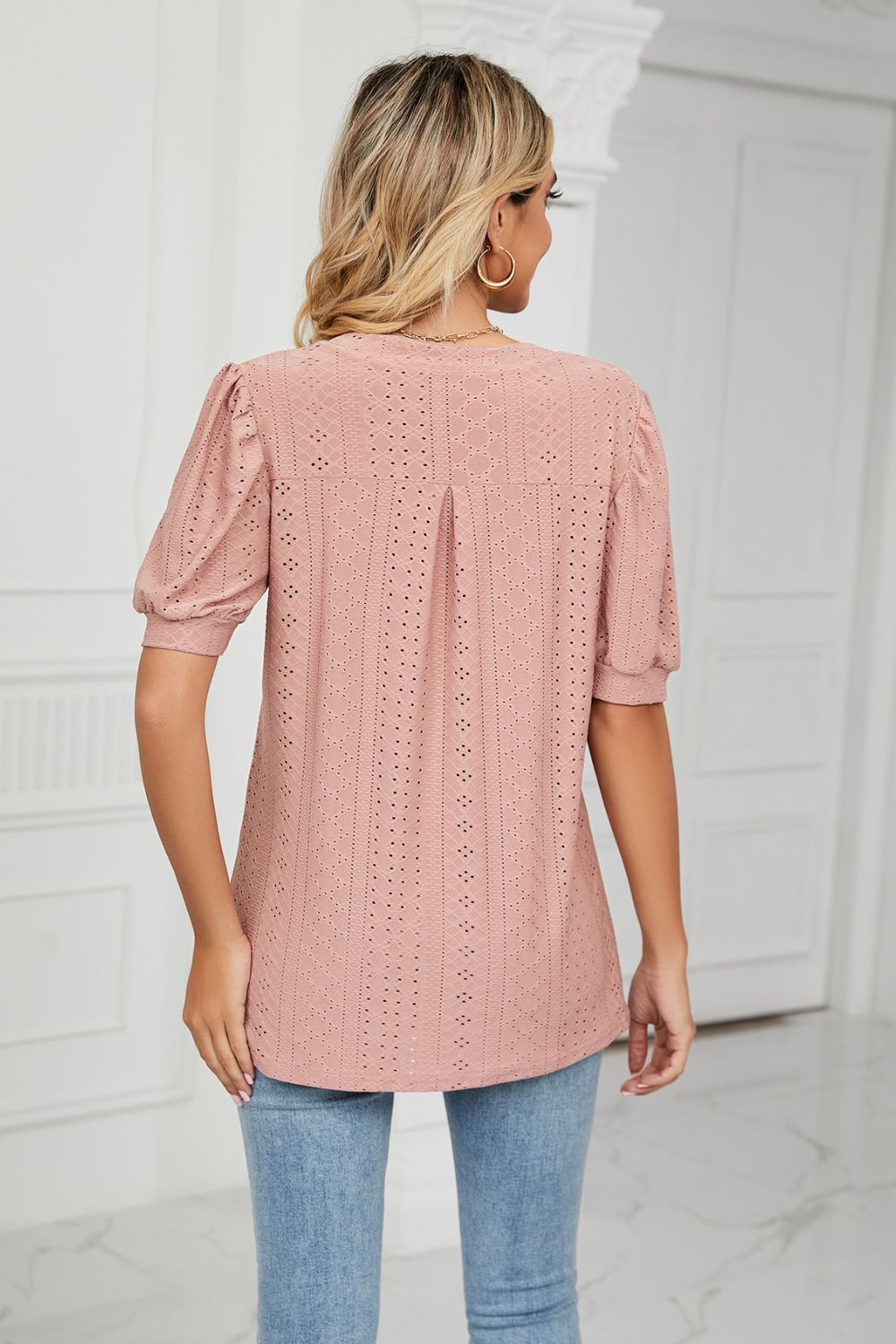 Eyelet puff sleeve top with notched V-neck