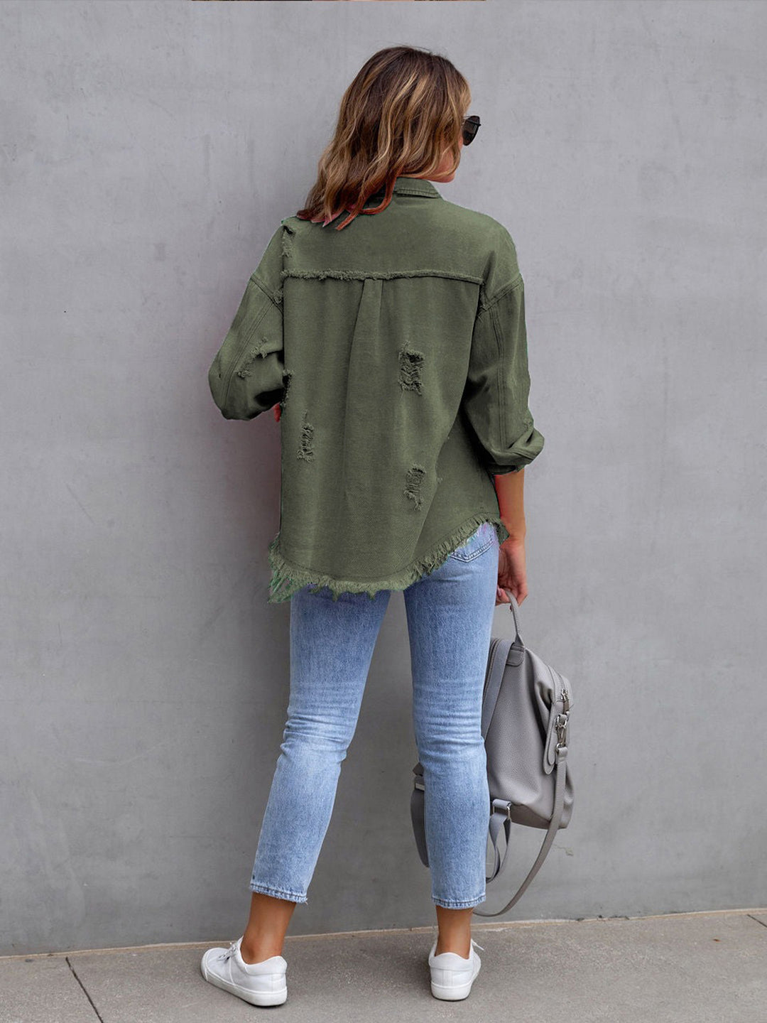 Distressed drop shoulder denim jacket with fringe hem